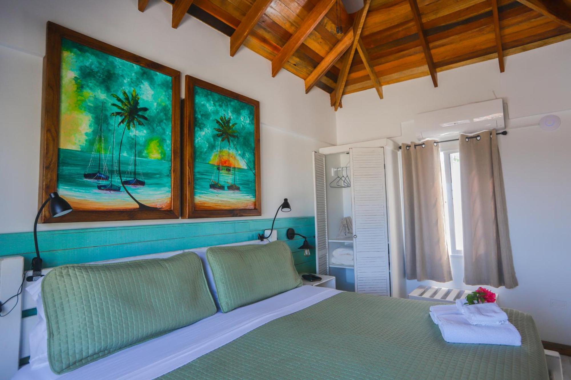 Treetops Hotel Caye Caulker Ruang foto