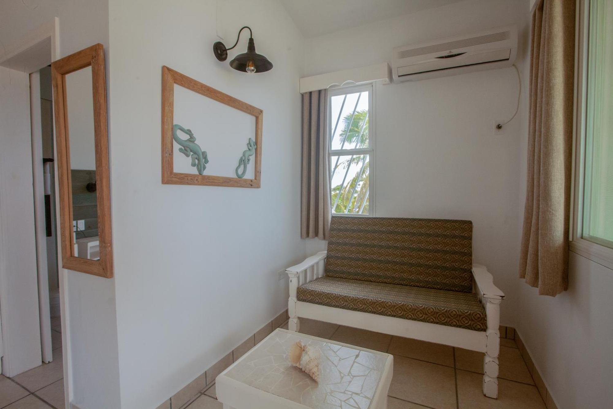 Treetops Hotel Caye Caulker Ruang foto